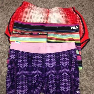 2 pairs of workout shorts. NIKE FILA